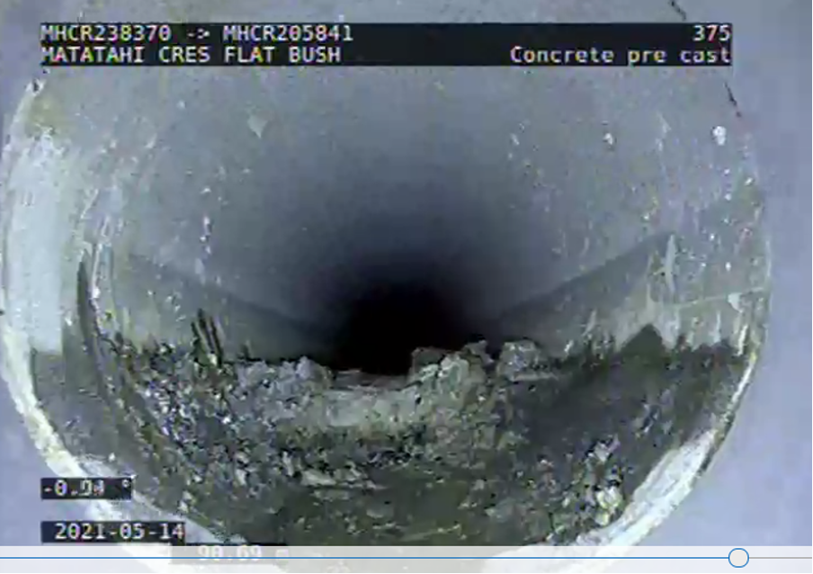 A shot from a scope in a stormpipe showing concrete filling and blocking the pipe at 29 Matatahi Cres