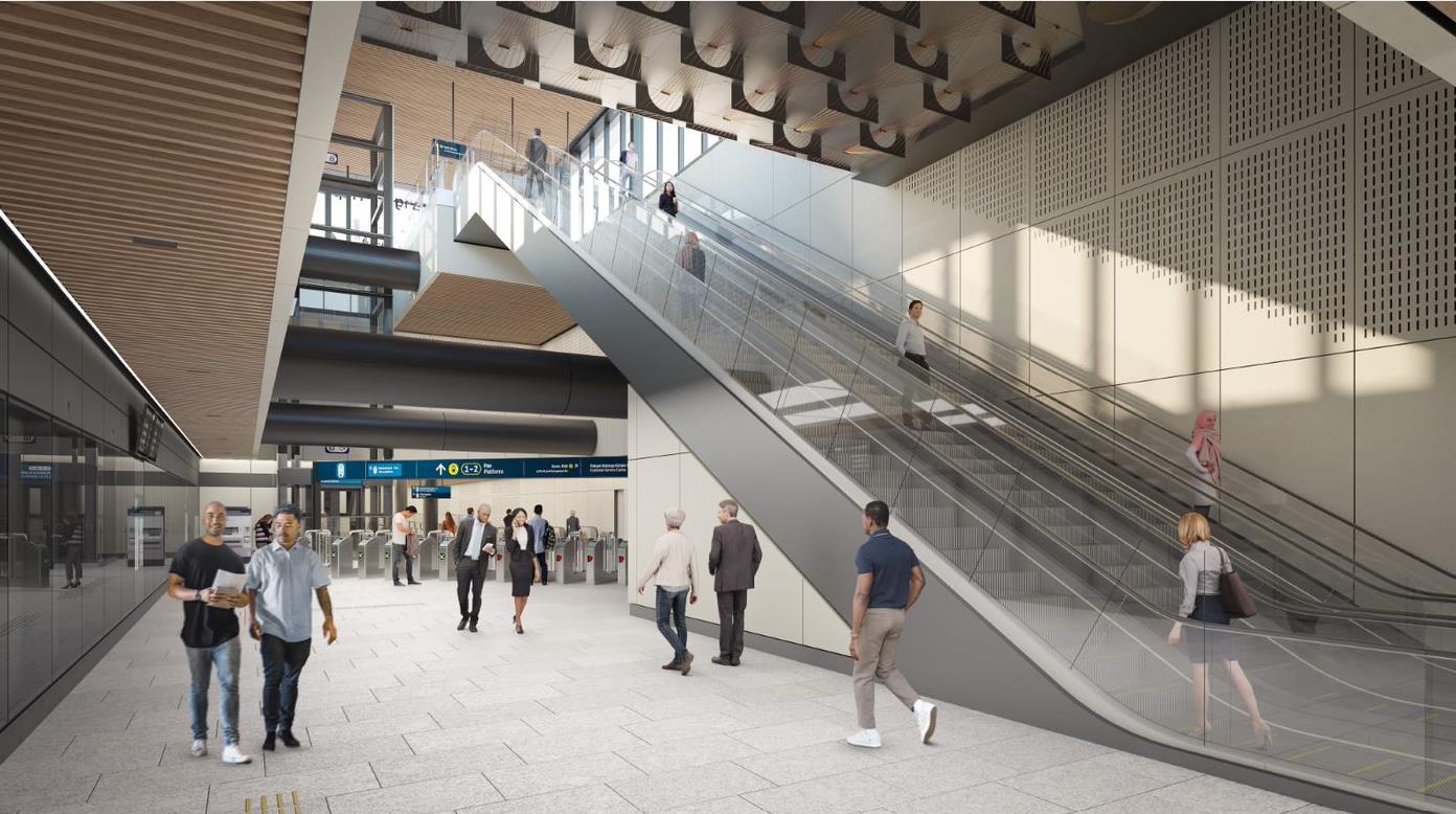 Inside Karanga-a-Hape station, looking up at the escalator and ceiling details. 