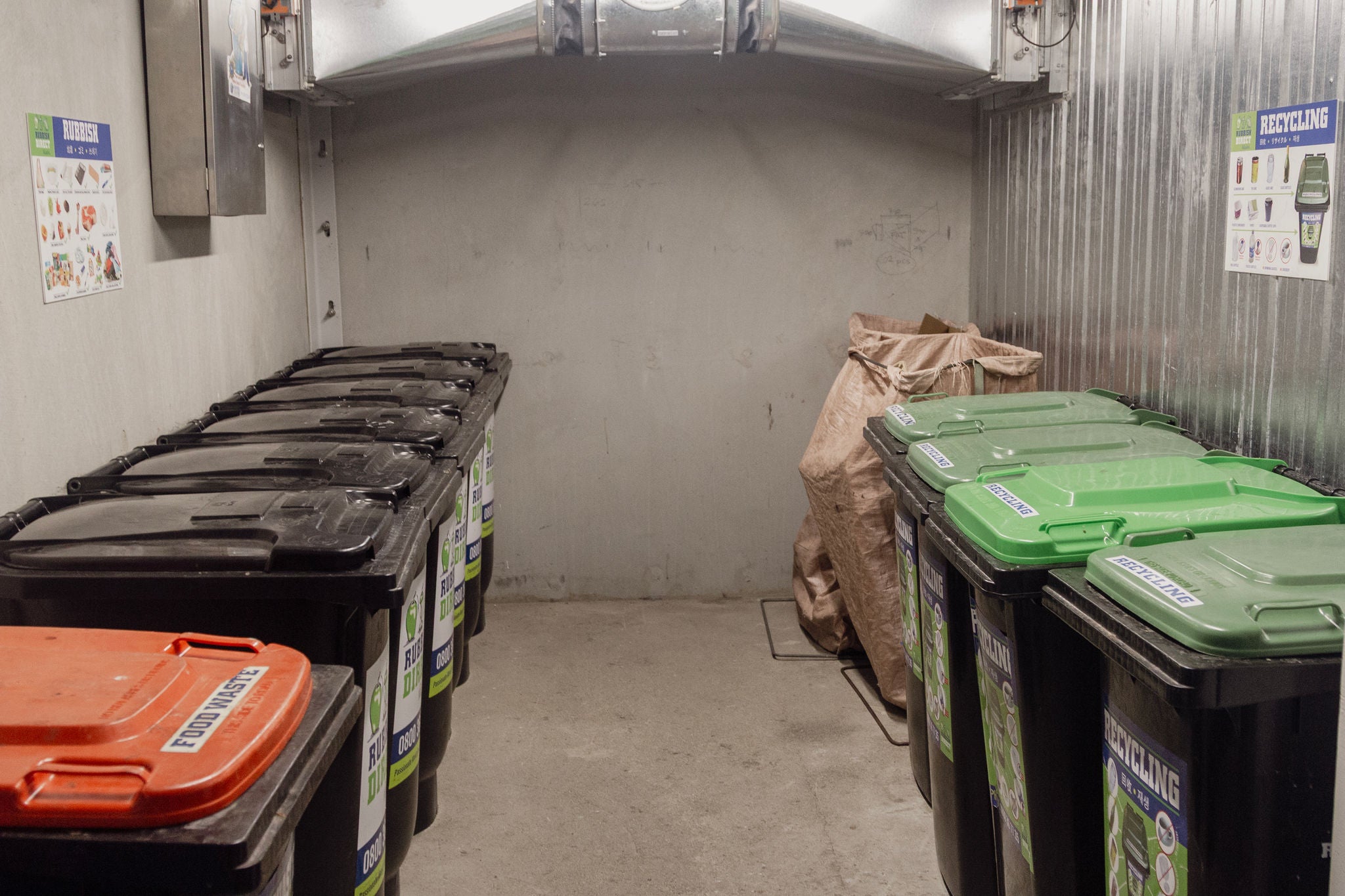 Mixture of rubbish bins emptied several times  a week.