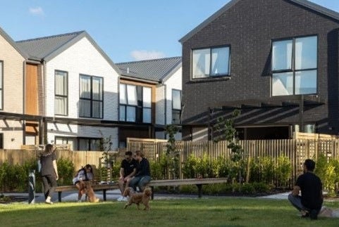 Public fronts face and overlook this common outdoor space. Privacy for residents is maintained by way of semi-permeable fencing. Image credit: Richmond Development.