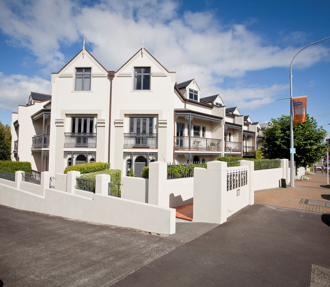 A corner site with victorian terraced houses.