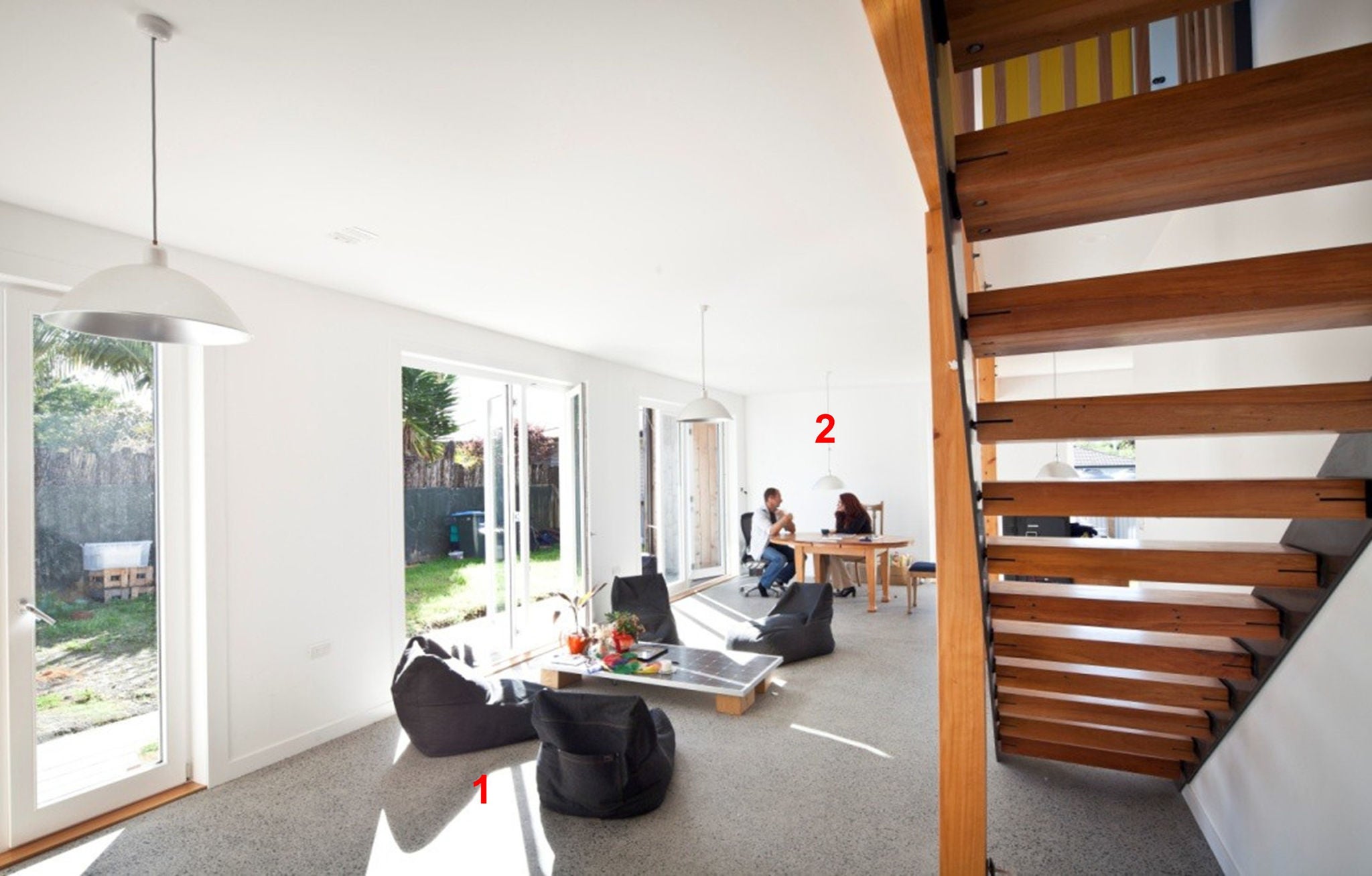 Internal layout, open plan and light, with afternoon sun.