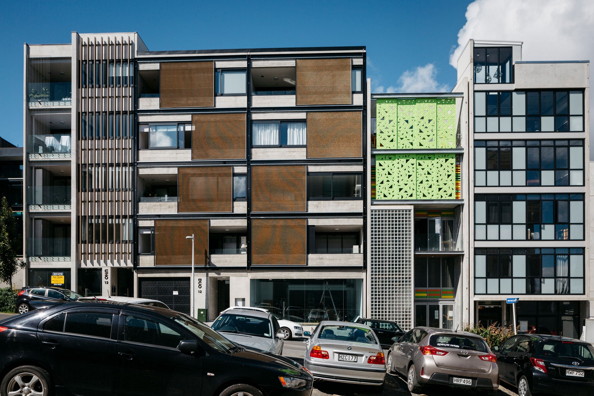  Zoomed in Vinegar Lane apartment with wood balcony panelling.