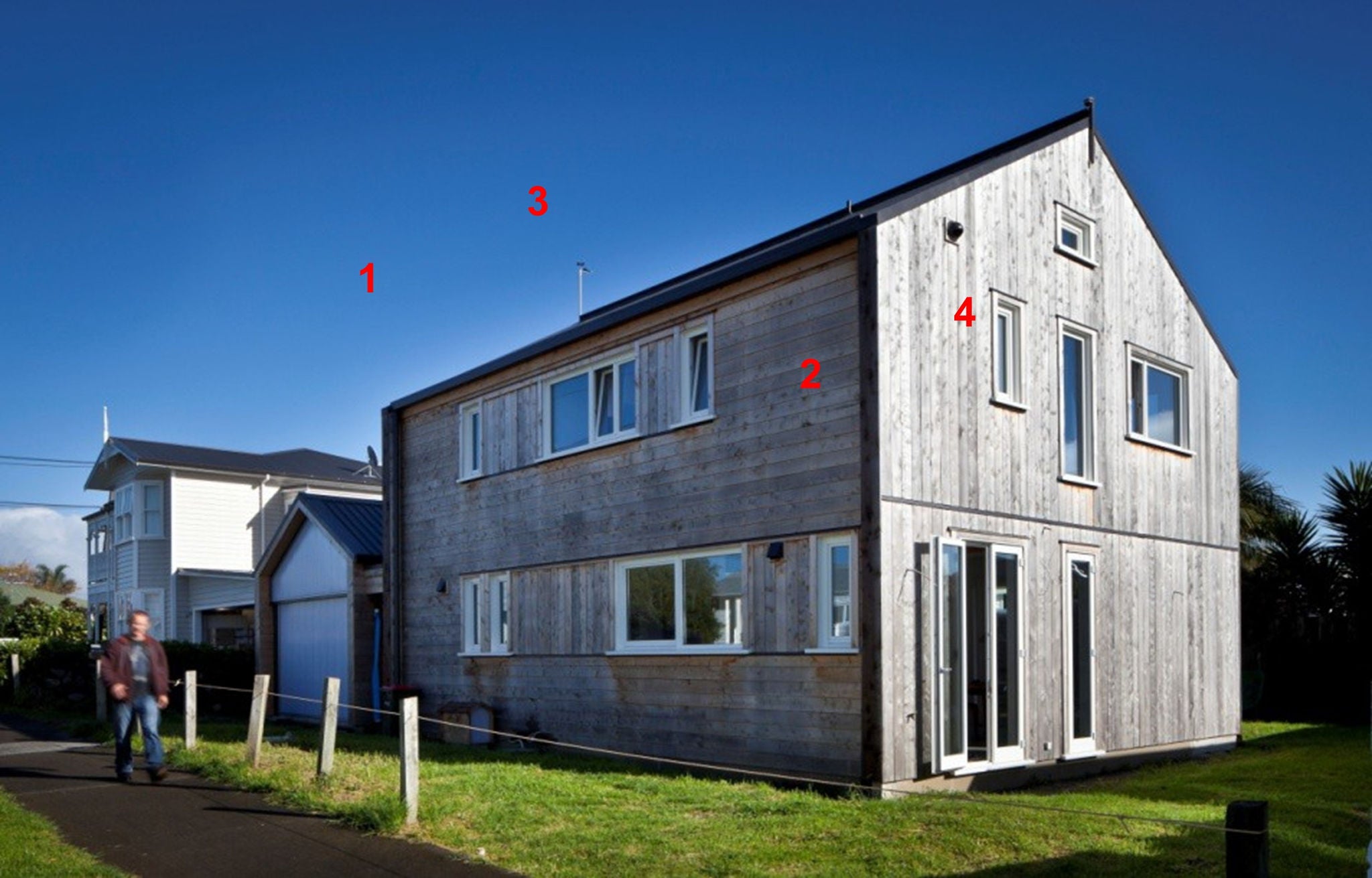 Building is placed in a West elevation, with minimized glazing to reduce solar gain.