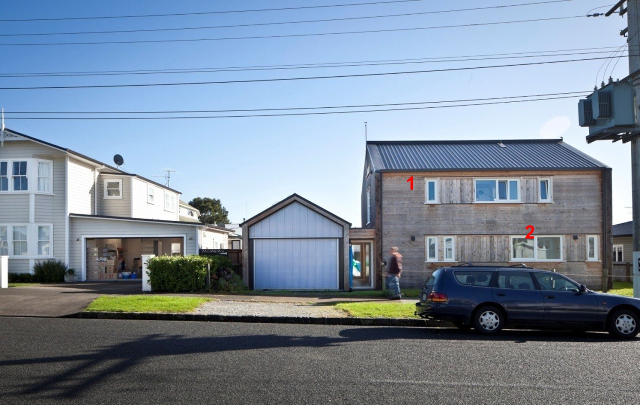 View onto the Zero Energy house from across the street, door accessible from the footpath