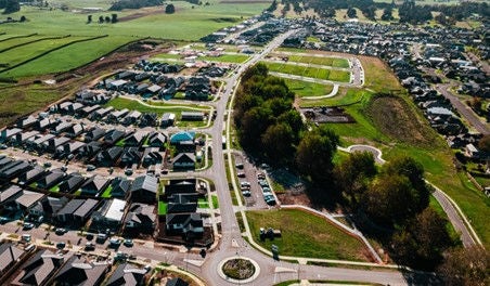 Retaining existing mature trees provides character to an otherwise standard subdivision. Image credit: CKL NZ.