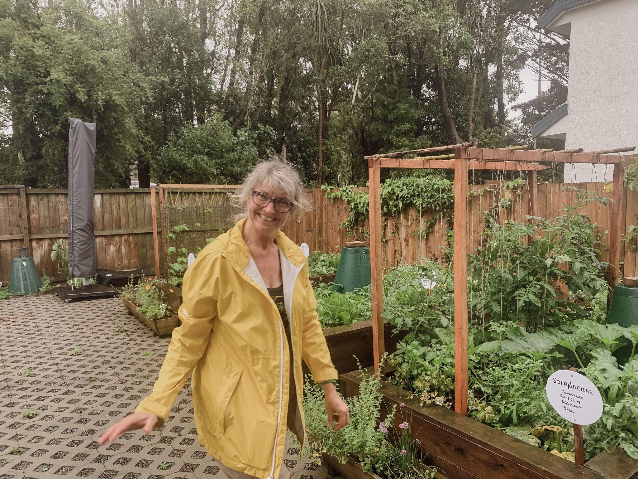 One of the owners in the communal veggie garden. 