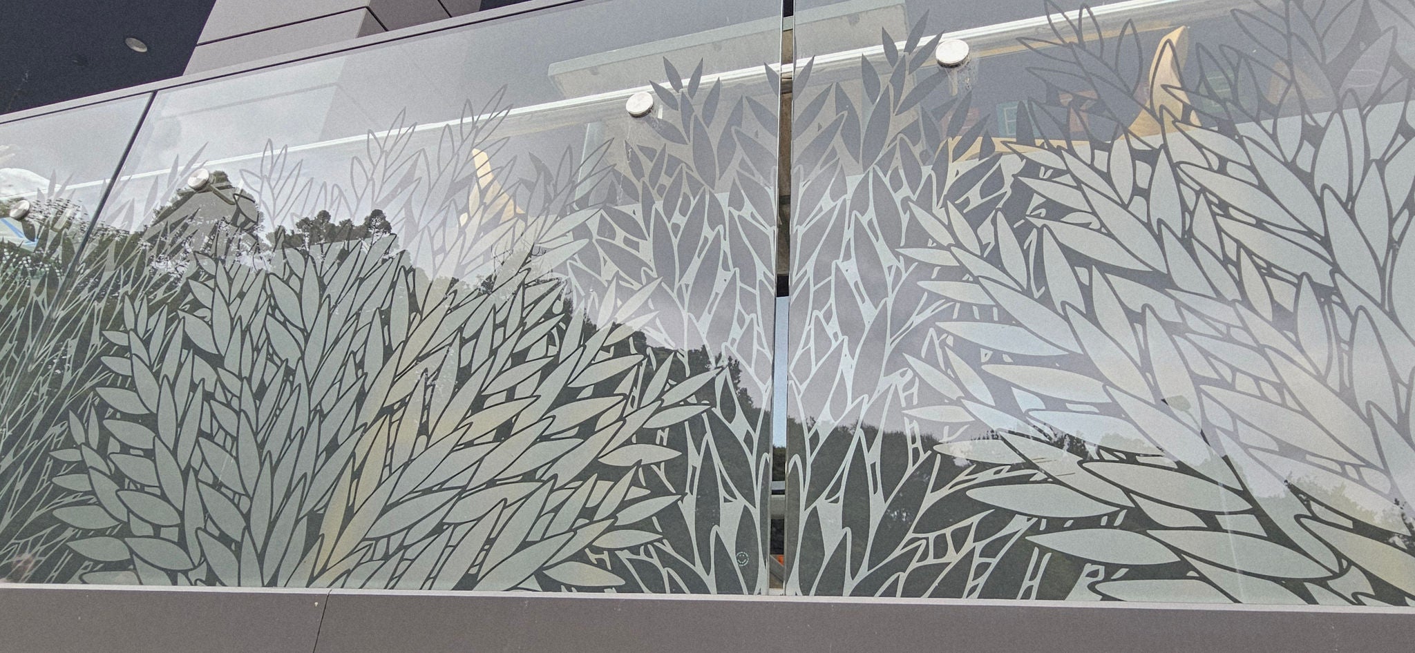 Leaves are printed onto the outdoor glass panels.
