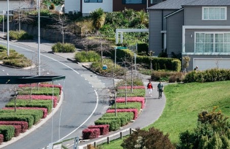Carriageways in subdivisions should be of a sufficient width to provide either a separated cycle lane or safe on-road cycling. Image credit: Boffa Miskell – Long Bay residential development
