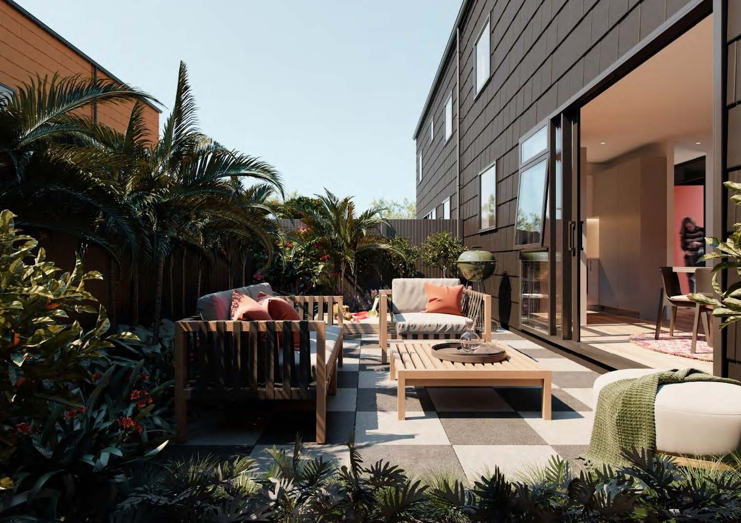 A modern and beautiful courtyard space with wooden furniture, plants and a BBQ. 