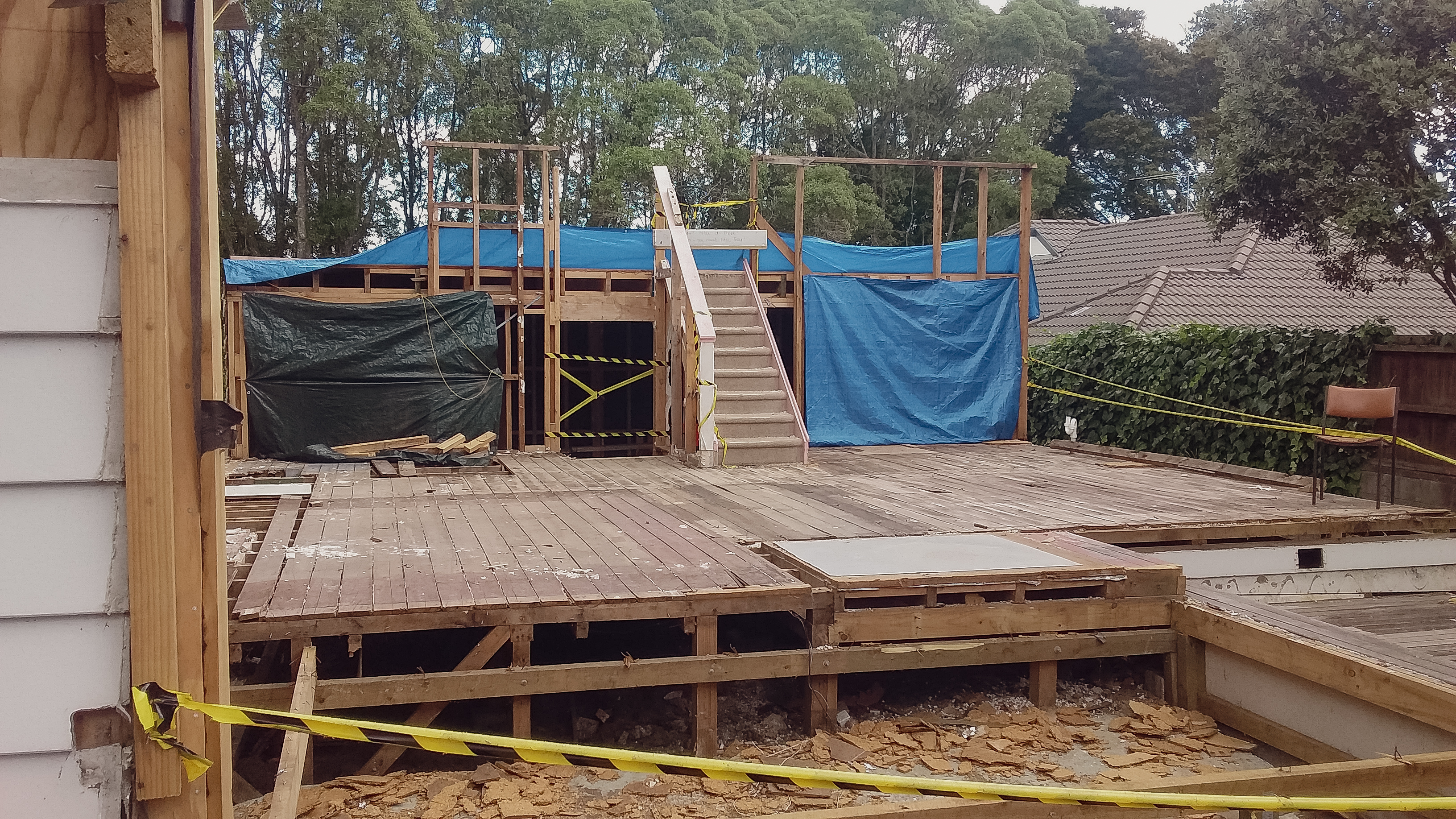 Foundations, flooring and stairs being demolished. 