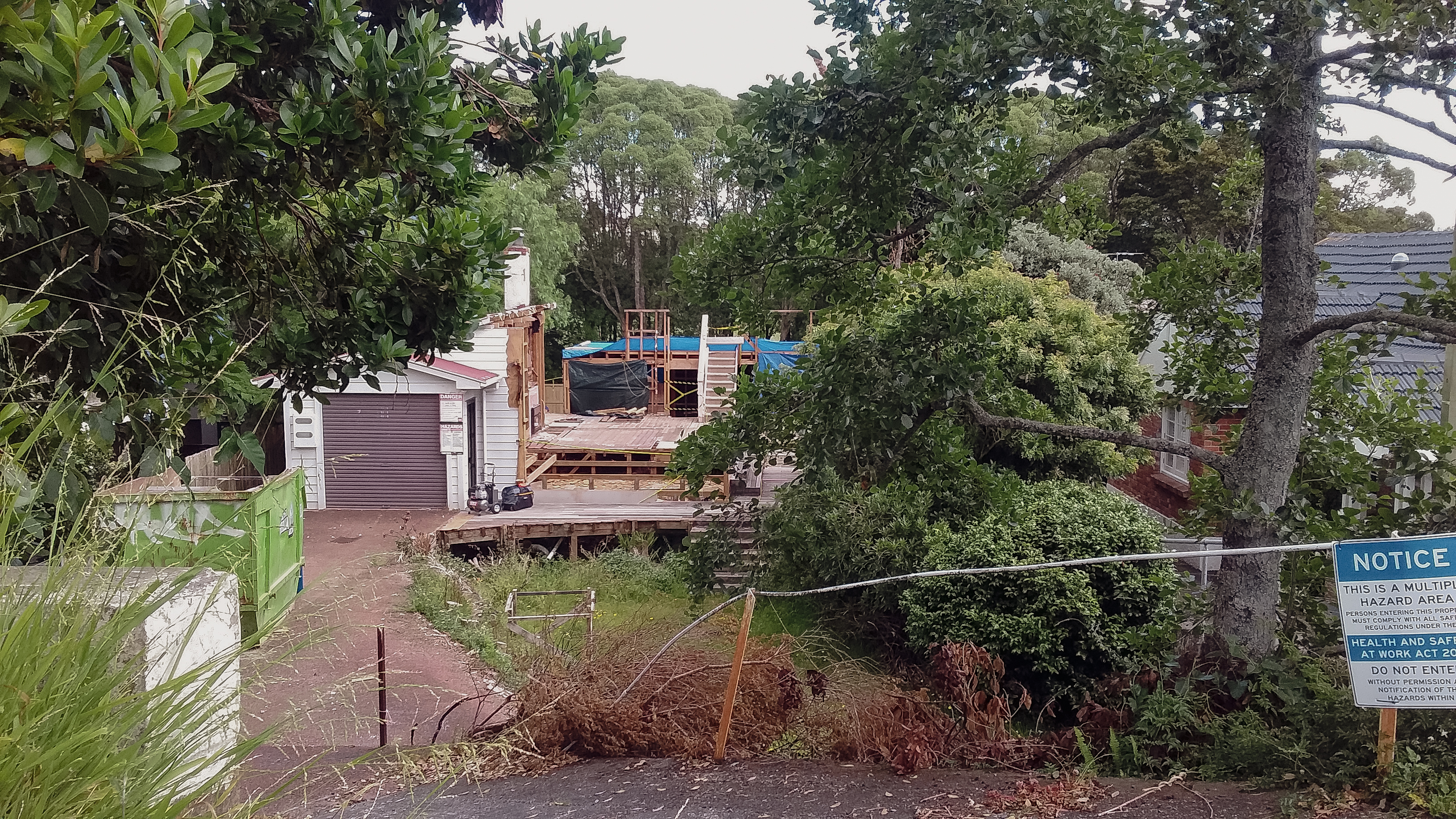 Looking at the old bungalow at 26 Aroha avenue being demolished from the street.
