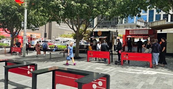 People having lunch at the table leaners created for Elliot St. Image credit - Simone Rinke