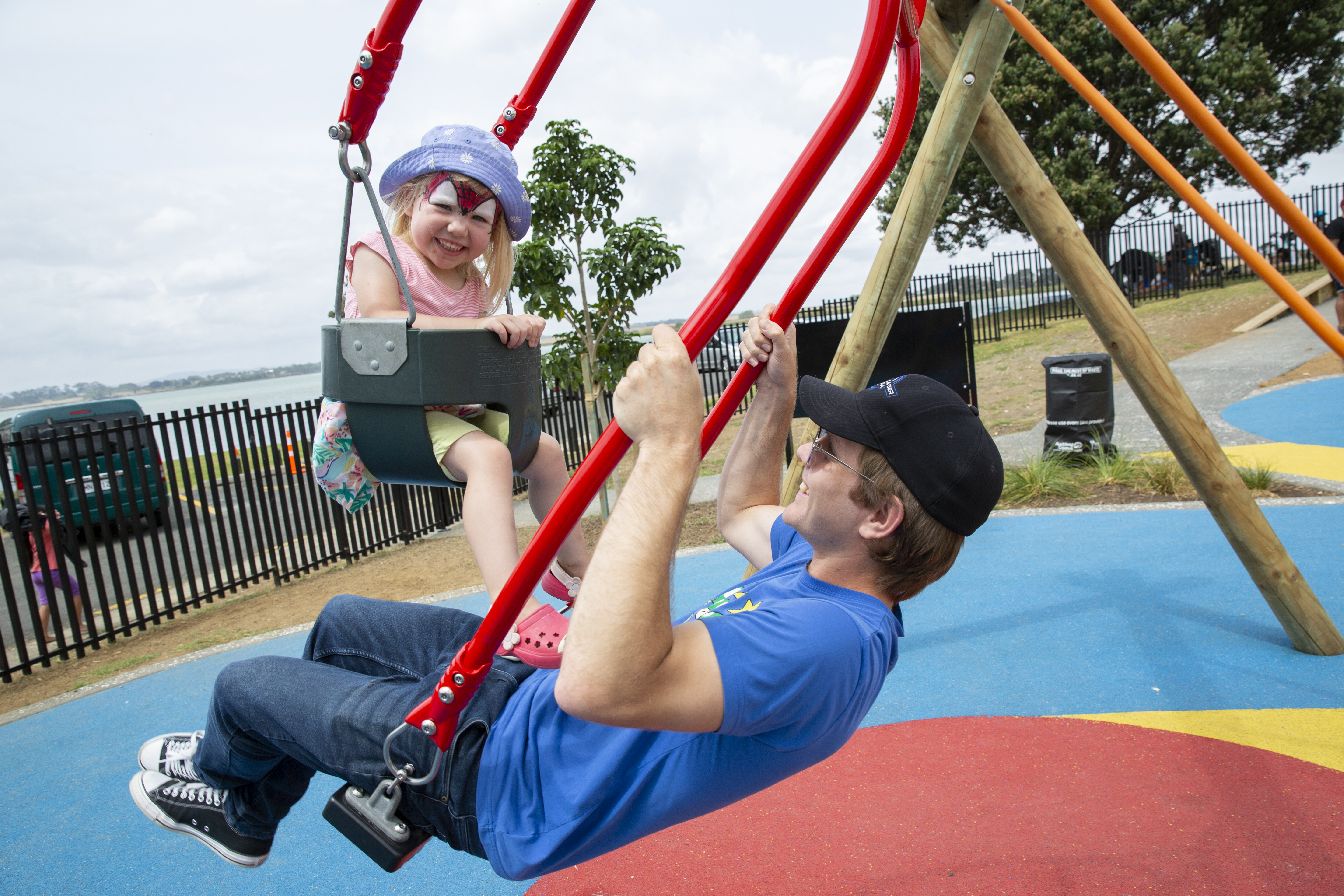 Caregiver and child swing