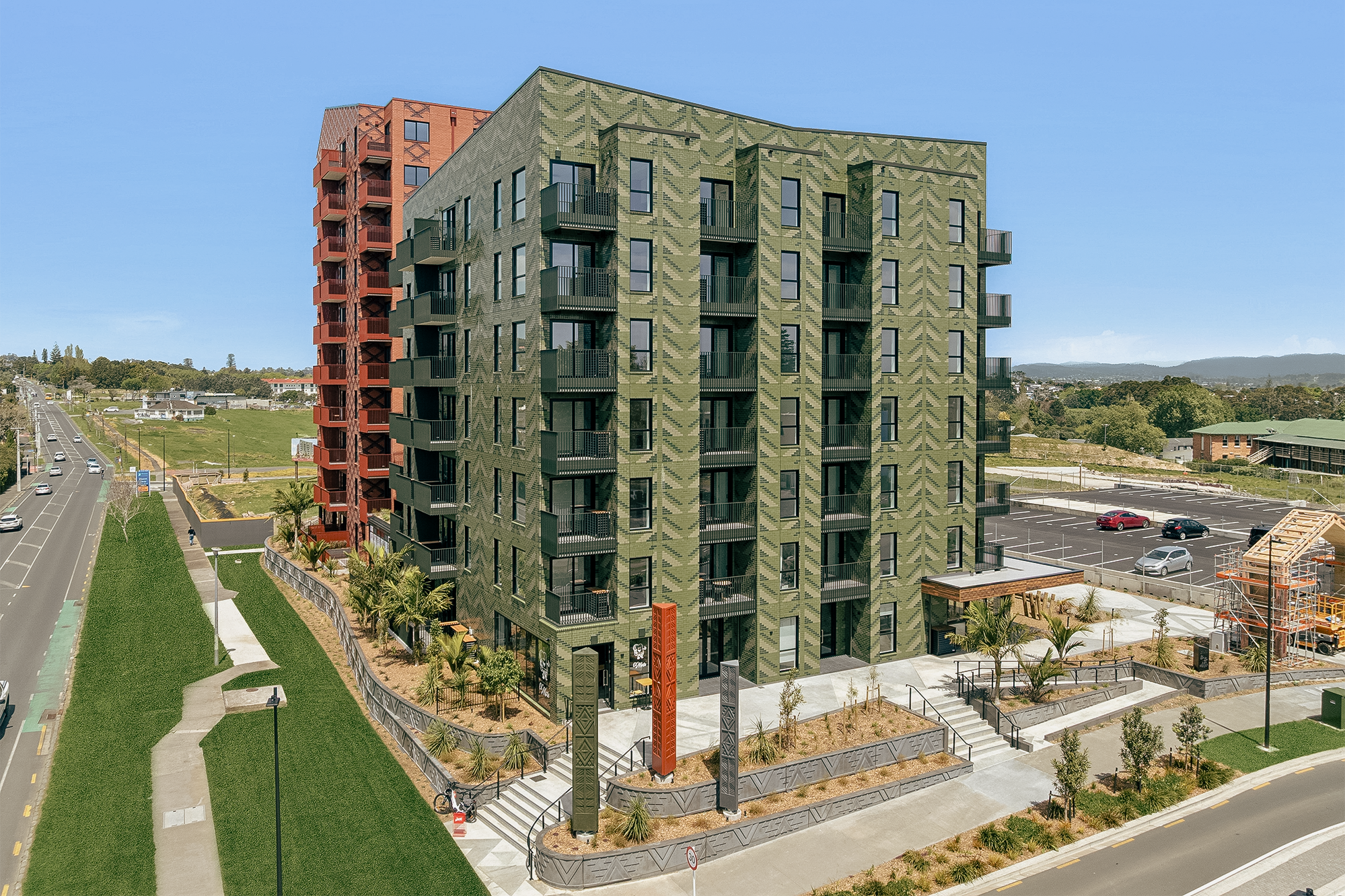 Two apartment buildings which have been designed in collaboration with Marutūāhu artists, with cultural landscape values embedded to communicate the visual identity of the Marutūāhu Rōpū (group), through brickwork reflecting tukutuku patterns and features such as pou, a waharoa and precast concrete retaining details.